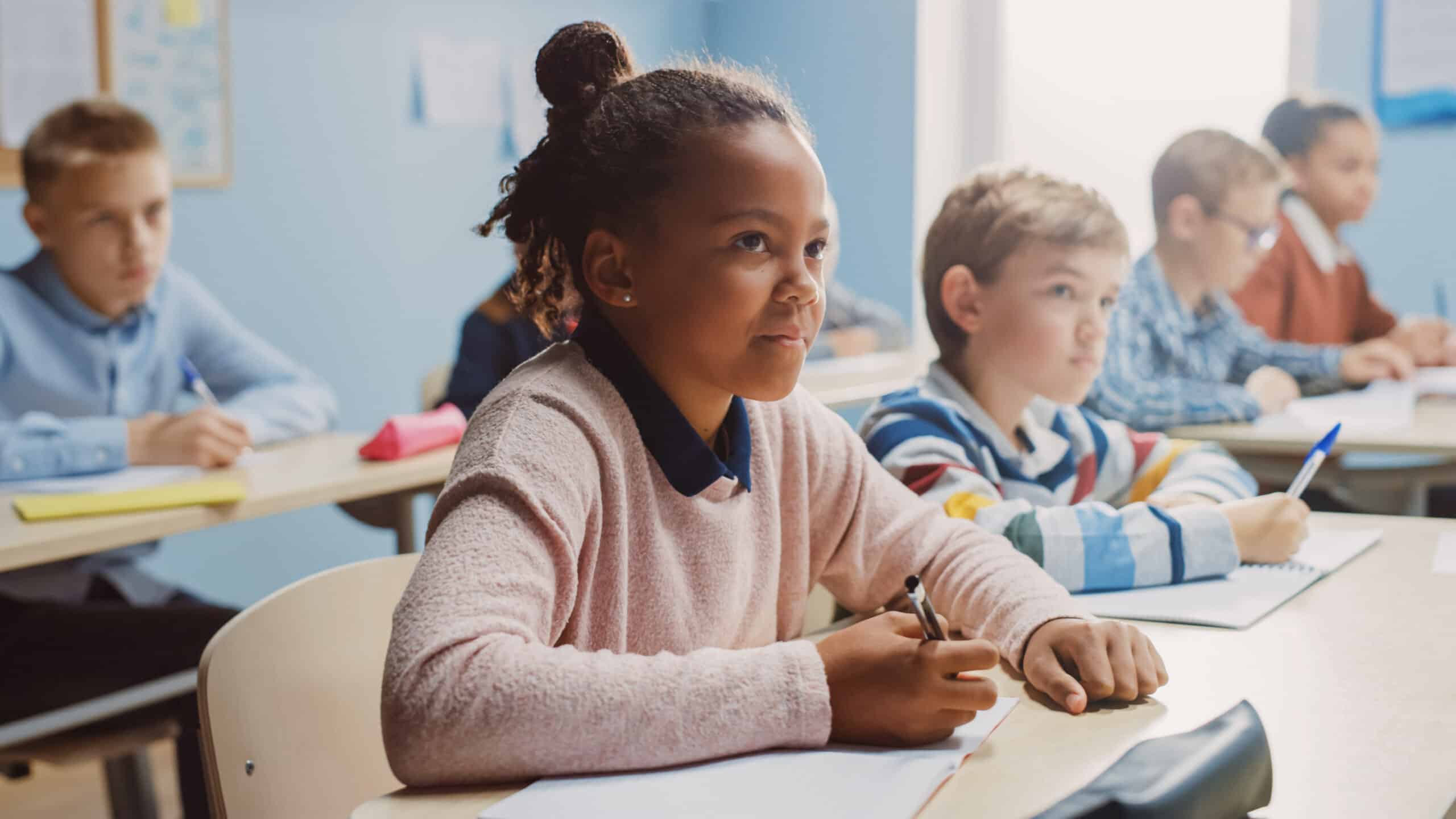 Student sitting at desk in class